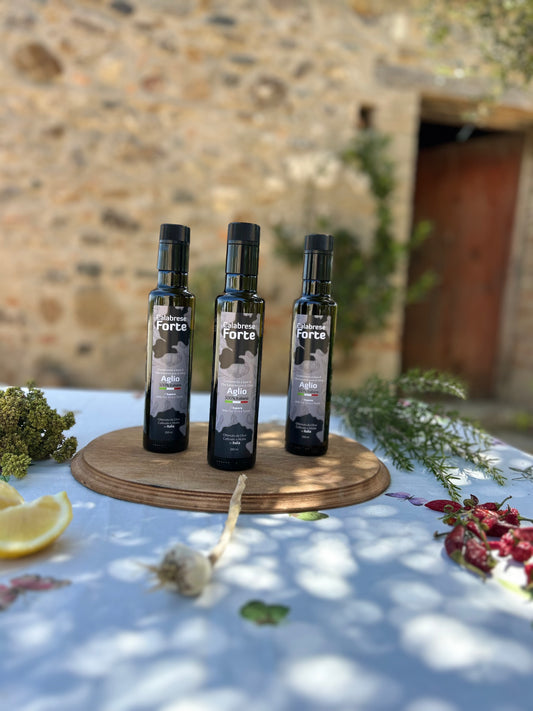 Box 3 Bottiglie - di aglio, rosmarino e olio extravergine d’oliva